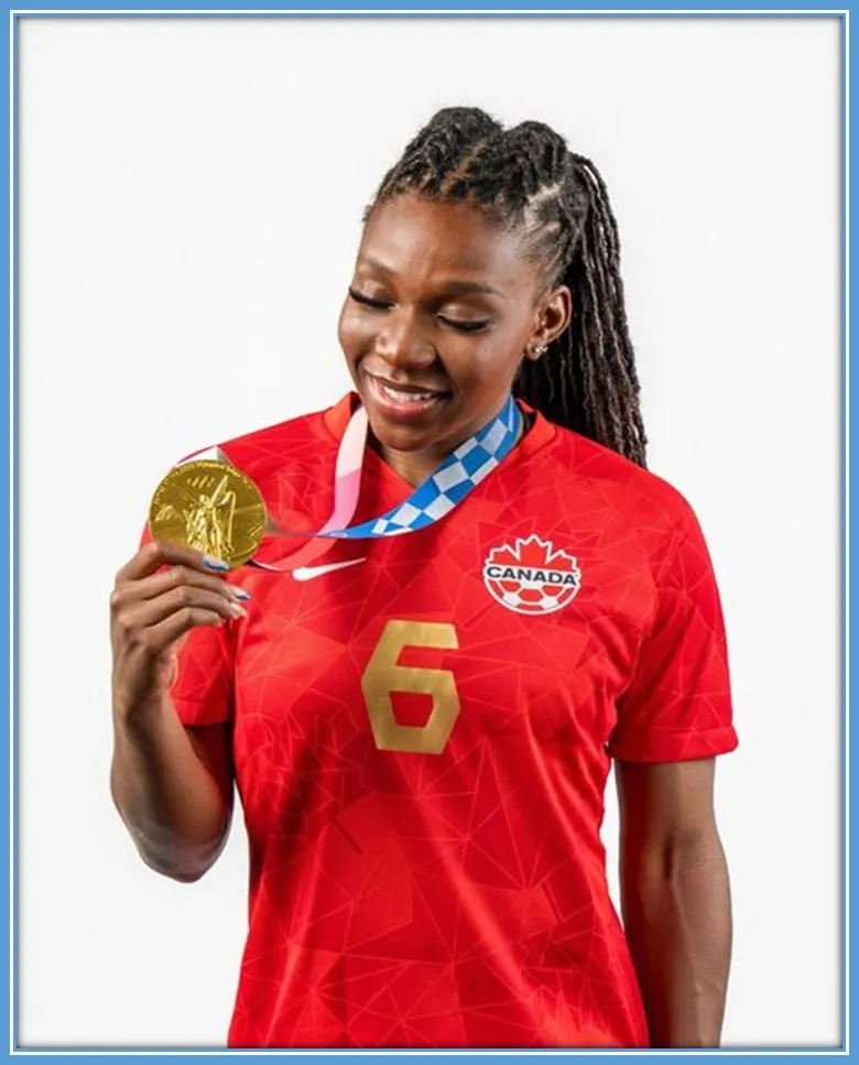 Deanne Rose enjoying the feel of her gold medal.