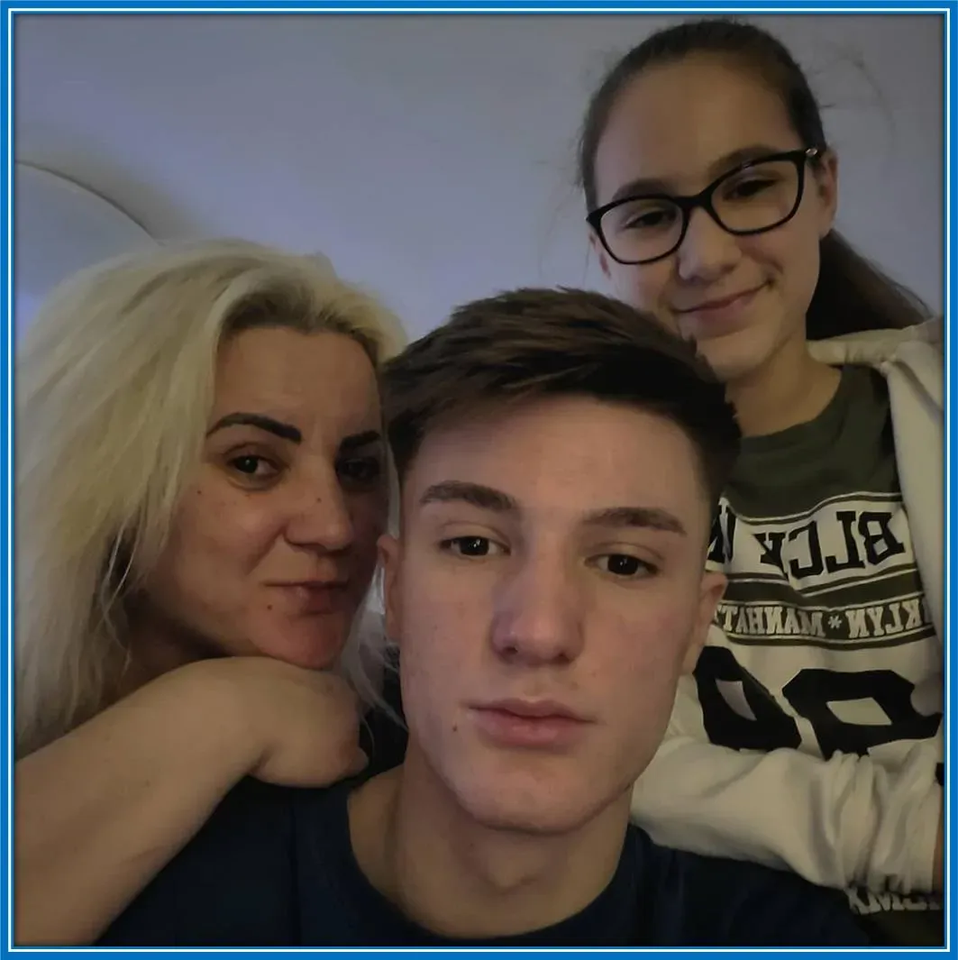 Home sweet home! Sesko's Mum and Sister welcome back their football-loving son and brother. Here, Benjamin looked like he couldn't wait to dig into his Mum's first delicious meal for his holiday.