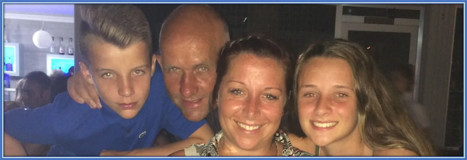 Behold the athlete's family- her kid brother by the left, Nick (father), Karen (mother) and the striker Ella Toone.