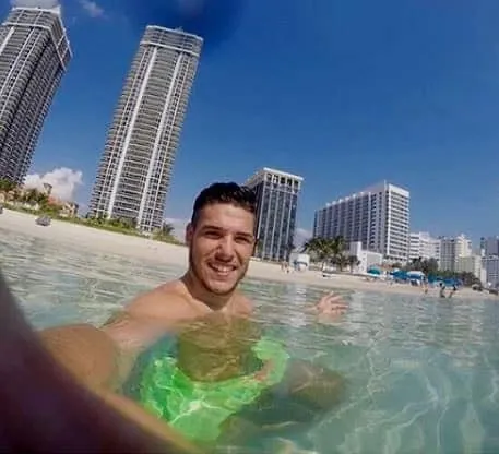 Emi Buendia enjoying his vacation at a beach in Miami.