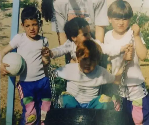 Childhood photo of Daniel Parejo (first from left) having fun with his peers at the park where they played football.
