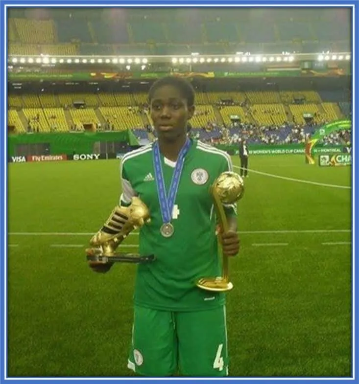 Oshoala put on display the Golden Shoe and the Ballon d'Or.