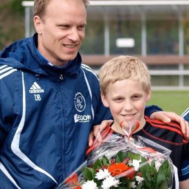 Donny van de Beek in a childhood photo with his father Andre. Credit: Veenscheboys.