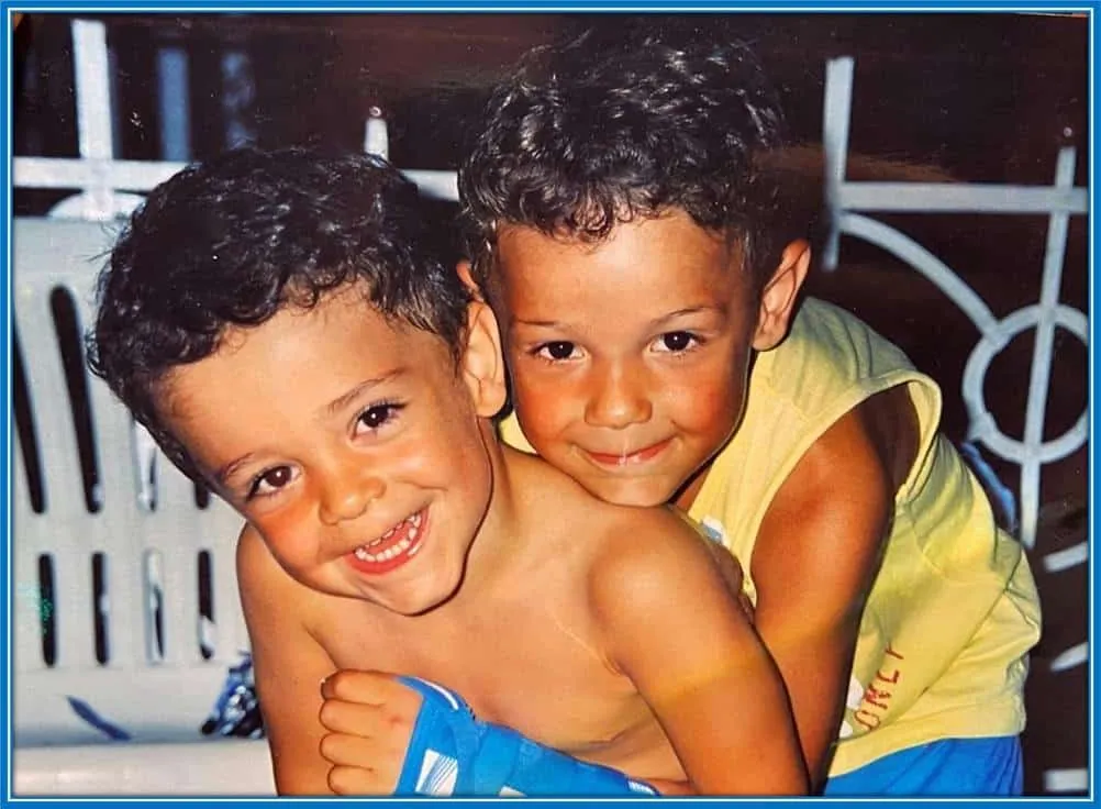 Giacomo Raspadori is pictured left, and his older brother, Enrico, is pictured right. They both have fond childhood memories, which they cherish, even to this day.
