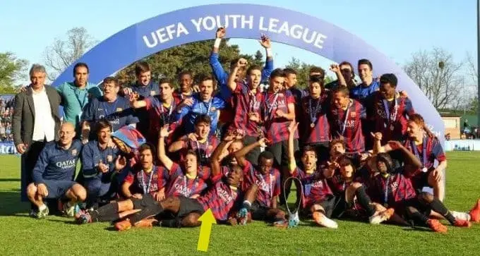 Adama Traore is pictured celebrating the UEFA Youth League with teammates. Image Credit: TalkSports