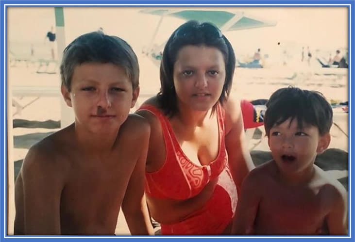 A cherished childhood snapshot of the Acerbi siblings - Federico, Francesco, and Sabrina, enjoying their beach outings. Credit: Instagram/francescoacerbi88