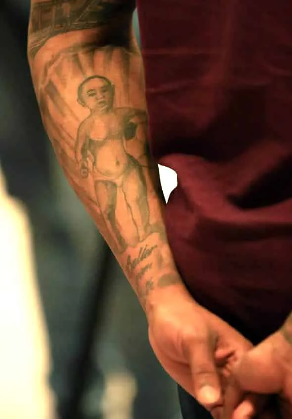This is a tattoo of Nathaniel Clyne that depicts his childhood days.