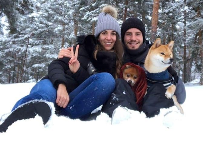 Soccer star Saul Niguez and his wife Yaiza share a deep bond with their loyal pets, Boris and Thaila, proving loyalty exists beyond the field.