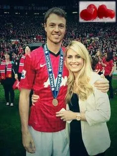 Helen McConnell and Jonny Evans are celebrating success together.