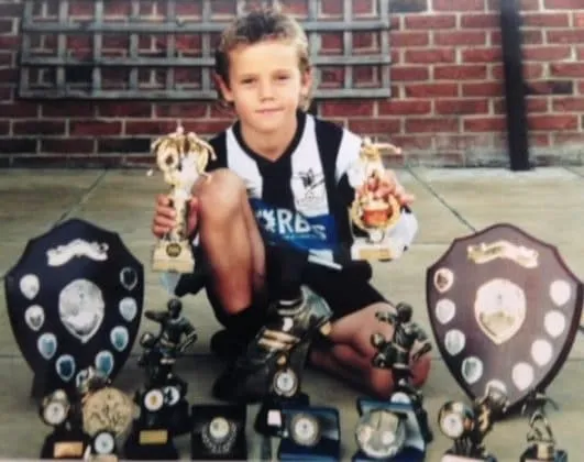 Here is Cantwell with the many trophies he won at Dereham Town Youth systems.
