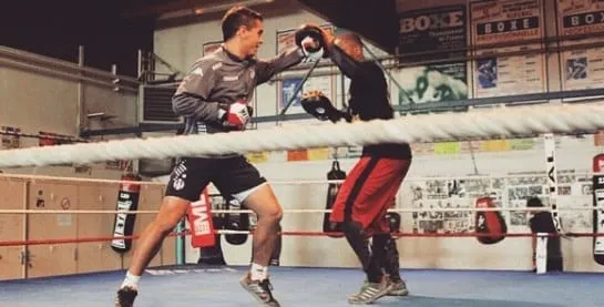 Wissam Ben Yedder (left) is engaging in boxing with an opponent. Credit to IG