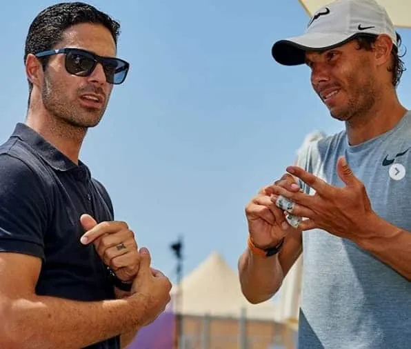 Mikel Arteta loves tennis and keeps up with the sport. He is pictured here with Rafael Nadal on a tennis training court.