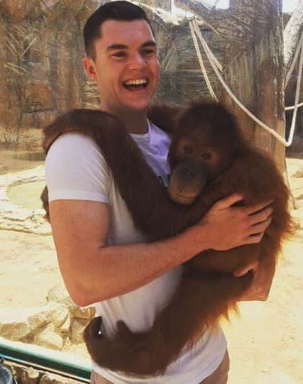 Micheal Keane spends money on tourist attractions during his vacations. 