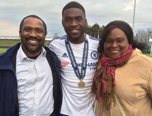 Fikayo Tomori was pictured together with his parents.