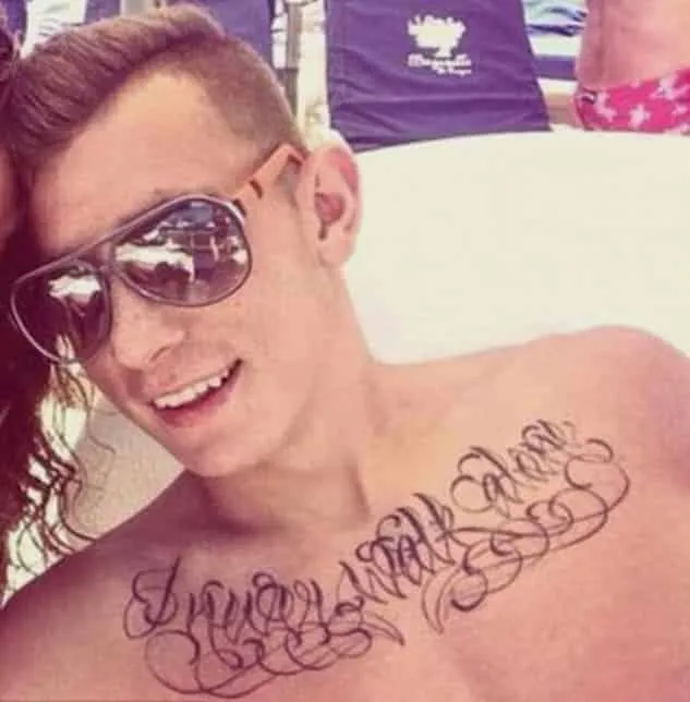 Lucas Digne's chest tattoo reads "I'll never walk alone". Image Credit: Instagram.