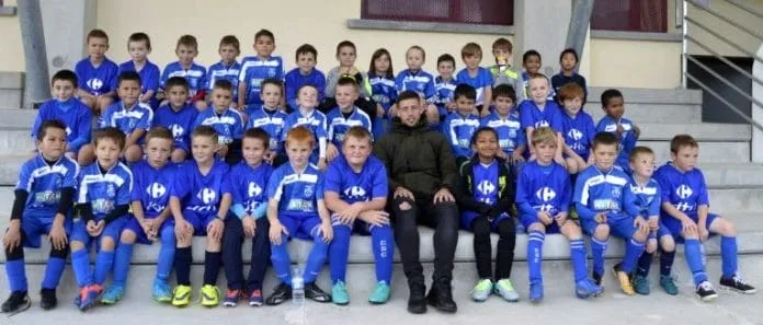 Clement Lenglet Early with his Football Career- Here, he poses with his fellow young players.