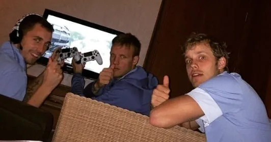 Here is Teemu Pukki watching his friends play on a Game Console.