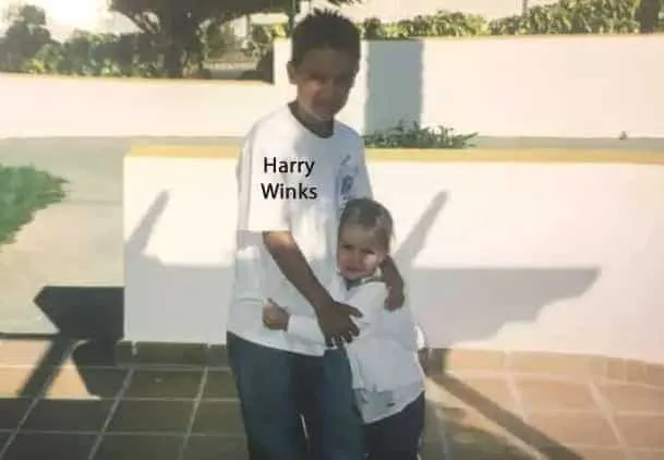 Young Harry Winks with his sister Milli, sharing a moment of love during their childhood days.