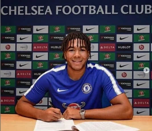 Reece James signing his first professional contract with Chelsea in 2018. Image Credit: Instagram.