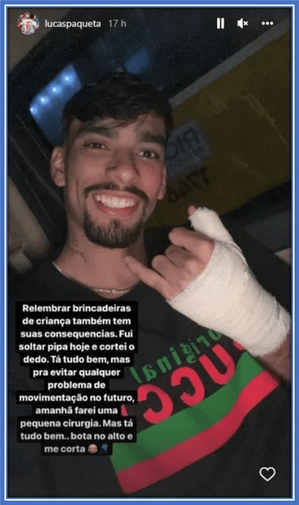 A photo of Lucas smiling with his right hand bandaged as a result of injuries from the flying kite.