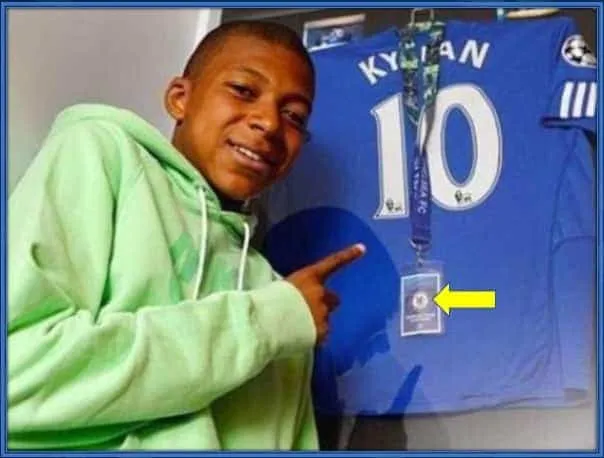 This is Kylian Mbappe, with a Chelsea shirt and ID card. This was just after his trials for the club that rejected him.