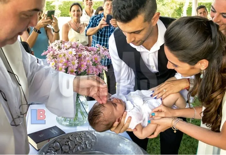 Javier Pastore and Chiara take their daughter for baptism.