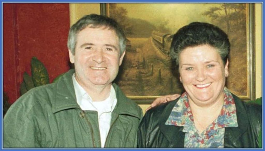 Meet Roy Keane's Parents. His Father's name is Maurice Keane. On the other hand, his Mother's name is Marie Keane.