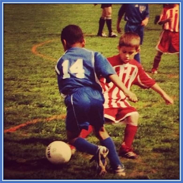 The box-to-box midfielder was pictured taking on an opponent - in his early career years.