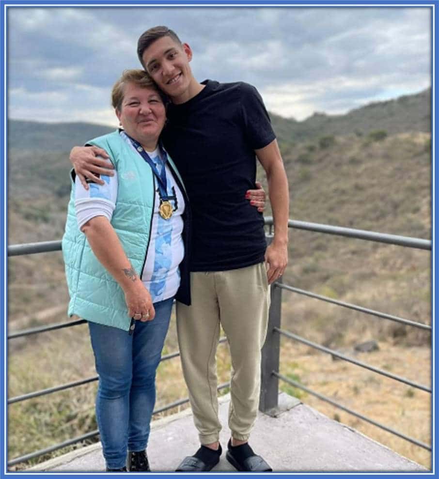 Lelia Lucero is celebrating her son's win. Looking at the photo, you can deduce that their connection is deep.