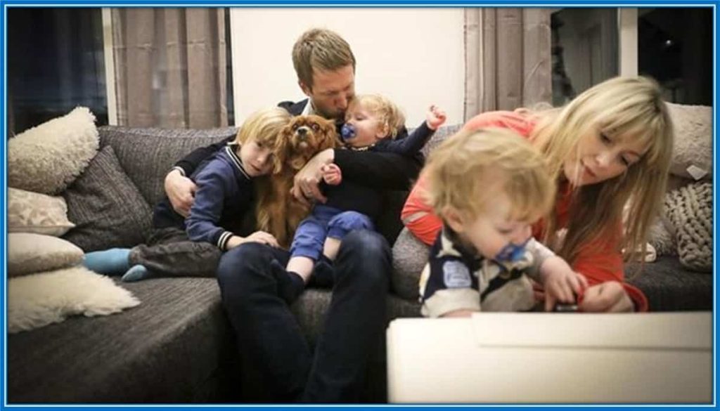 Graham Potter holds one of his twin children - and Charlie, his first son. Rachel is with the other twin. The twin kids bear the name - Theo and Sam.