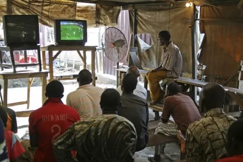 Back in the day, Kelechi was among these boys who watched the Premier League from these kinds of viewing centres.