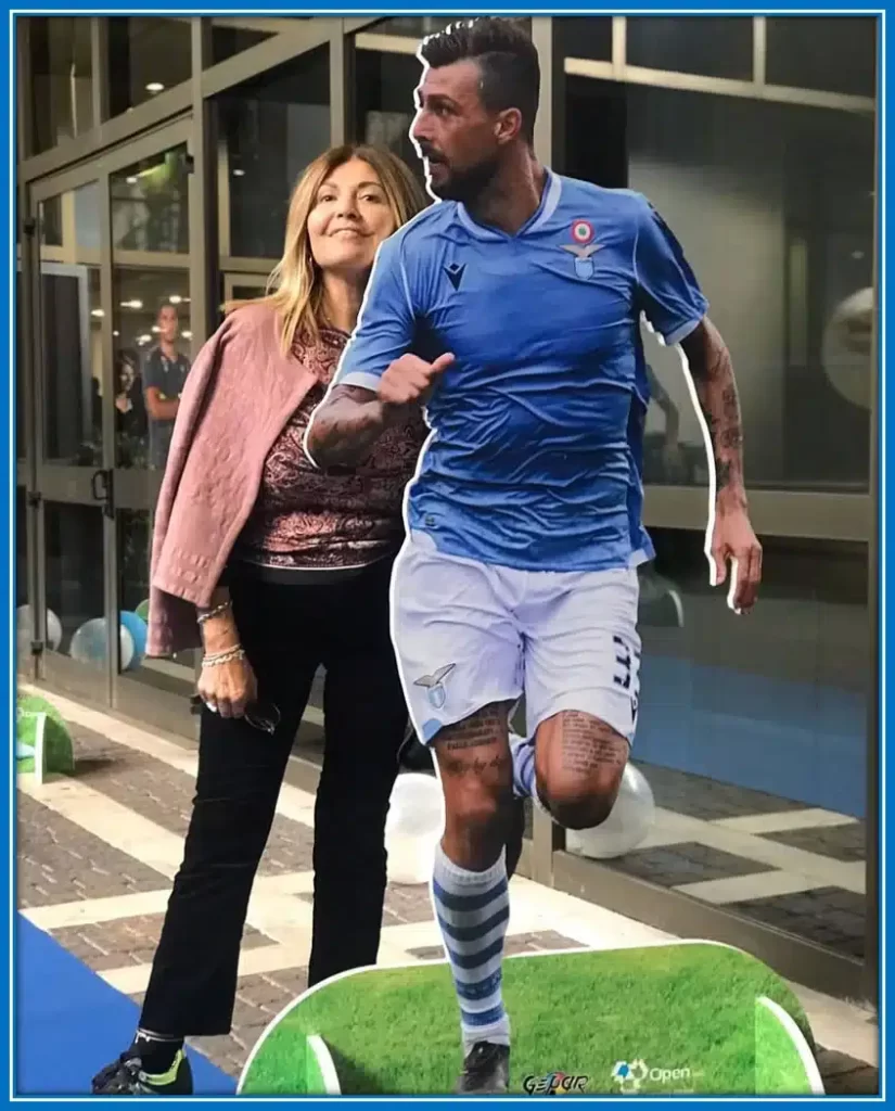 Francesco Acerbi's humorous Mother's Day tribute: his mother posing with a cardboard cutout of the soccer star, jokingly reminding her of his face.