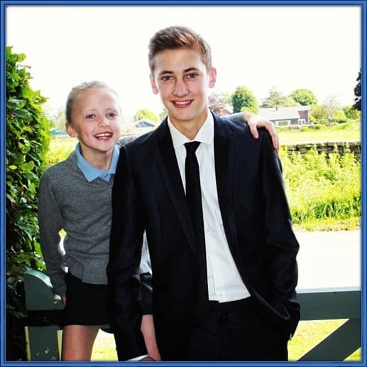 Nat Phillips Pre-Prom photo alongside his little sister, Saskia Rose Phillips. This shows he did went to school.