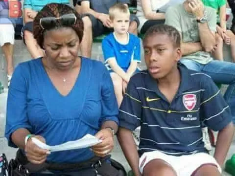 Mrs Chuba Iwobi reviews her son's performance report.