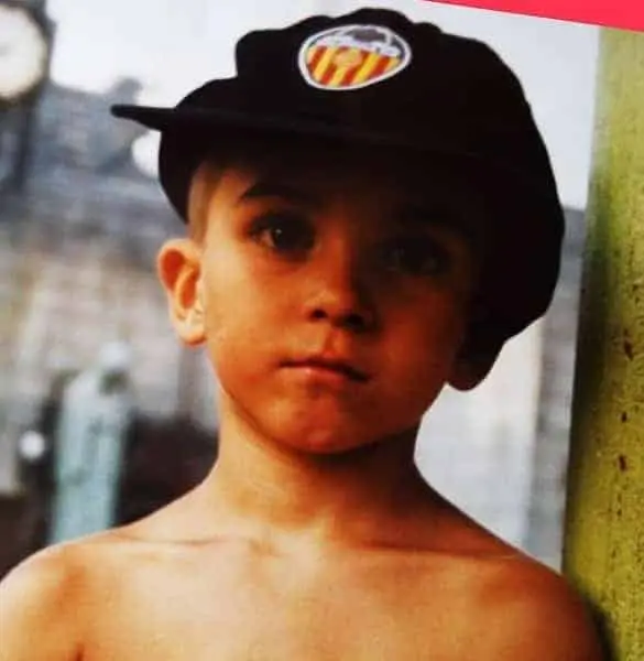 He grew up as a soccer enthusiast. Can you guess what club logo is on his cap? Image Credit: Instagram.