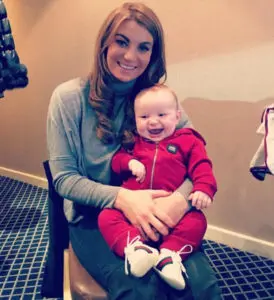 Billi Mucklow and Arlo (Andy Carroll's son) take a photo.