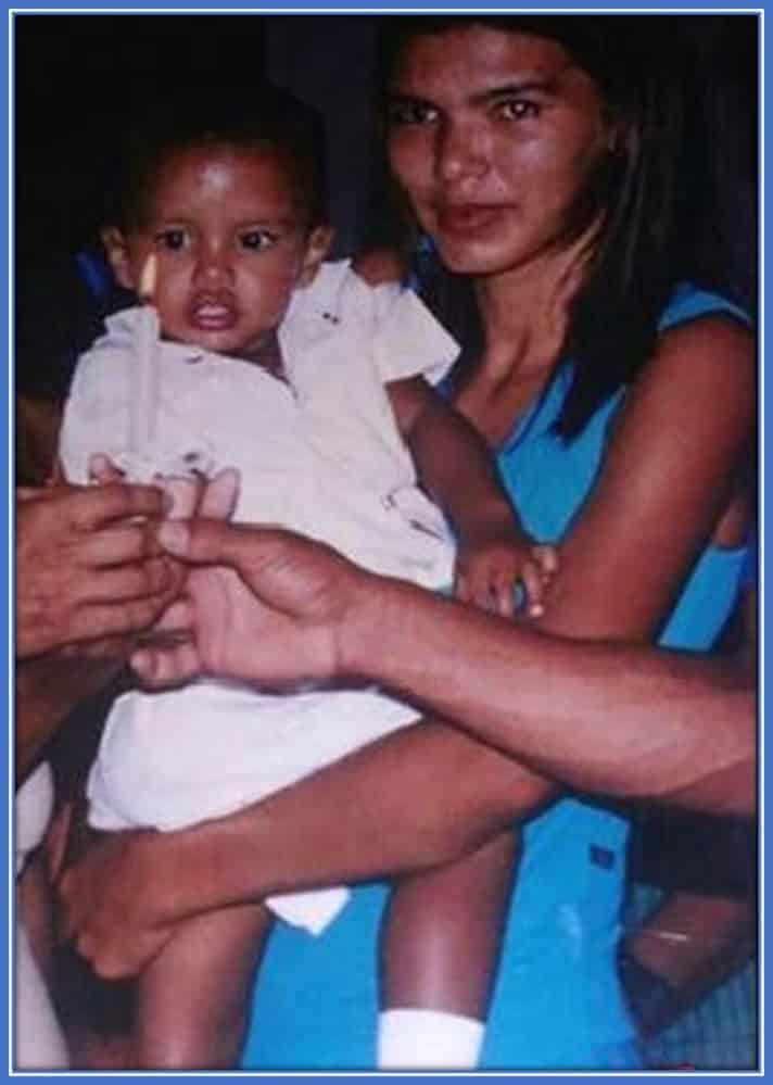 Gabriel Veron as a baby. He is pictured alongside his Mother as he receives Baptism from the Catholic Church, which his parents attend.