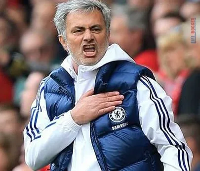 Photo of Jose Mourinho celebrating Steven Garrard's mistake.