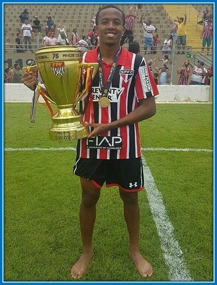 Eder Militao won holding a trophy he won at Sao Paulo's academy.