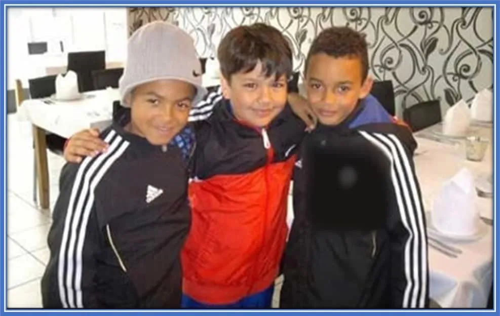 Childhood Memories in the Making: A young Levi (far left) and Jamal Musiala (far right) bonding over their shared passion for football. The two future stars, coincidentally sharing the same birthday, found camaraderie in Levi's hometown team, City Central.