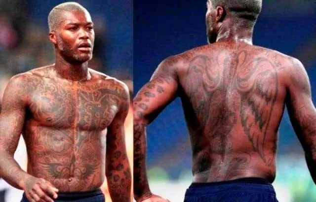 Djibril Cisse has all sorts of tattoos written over his body.