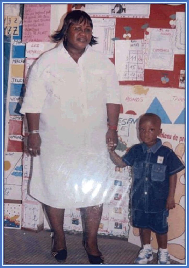 A pix of Ismael Kone and his mother during his childhood.