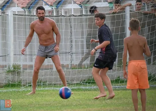 Buffon and his son enjoying the game of football.
