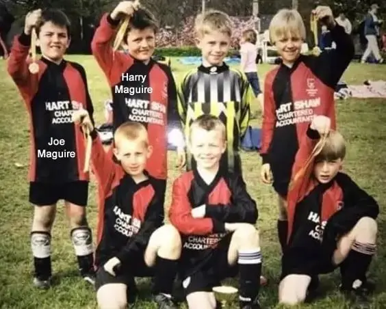 Young Harry Maguire in his Childhood, celebrating his medal alongside teammates.