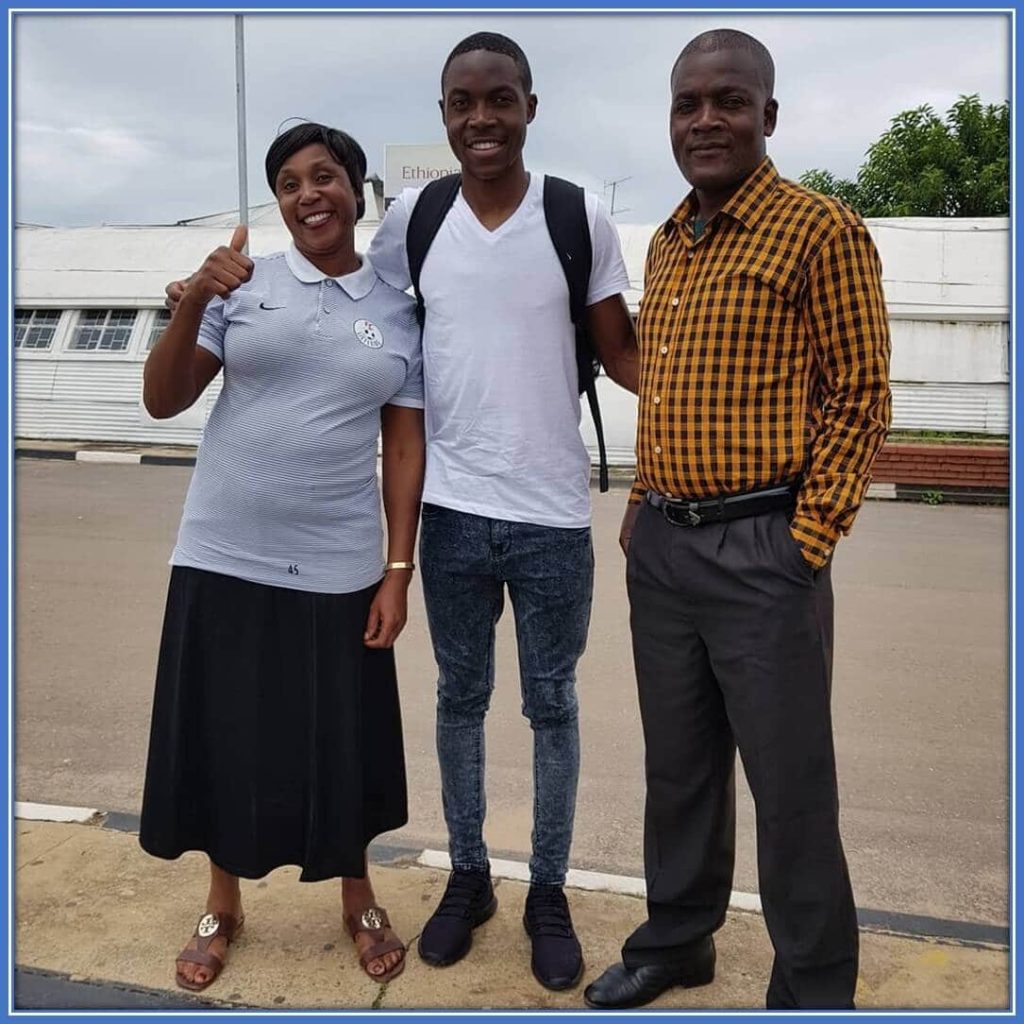 Meet his mother, Emmalle Mwepu, and father, Robby Mwepu. Indeed, they are proud to have a son like him.