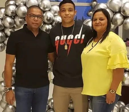 Luis Muriel with his supportive parents.