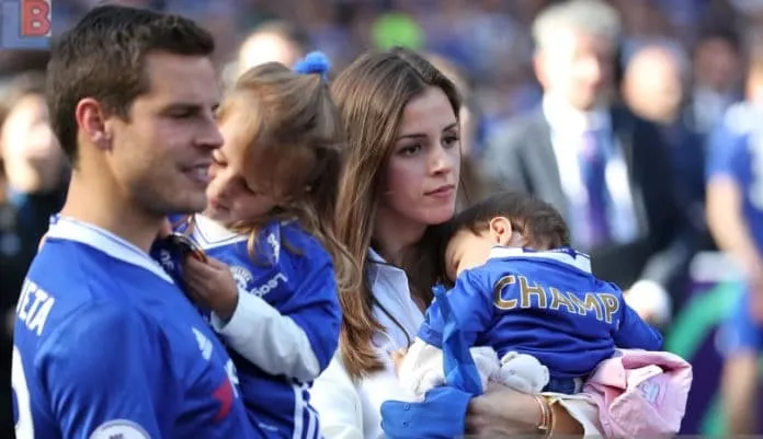 Adriana and Cesar Azpilicueta together with their kids.