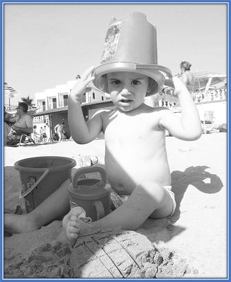 For Young Gavi, part of his childhood happiness was playing in the sand.