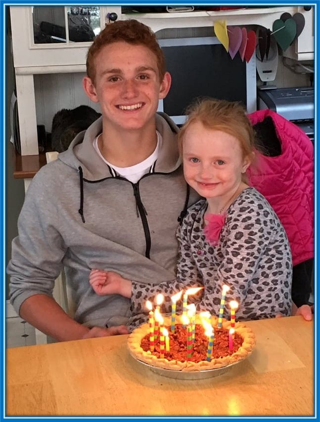 Josh Sargent's little sister (the youngest in his family) is pictured with him on his 17th birthday.