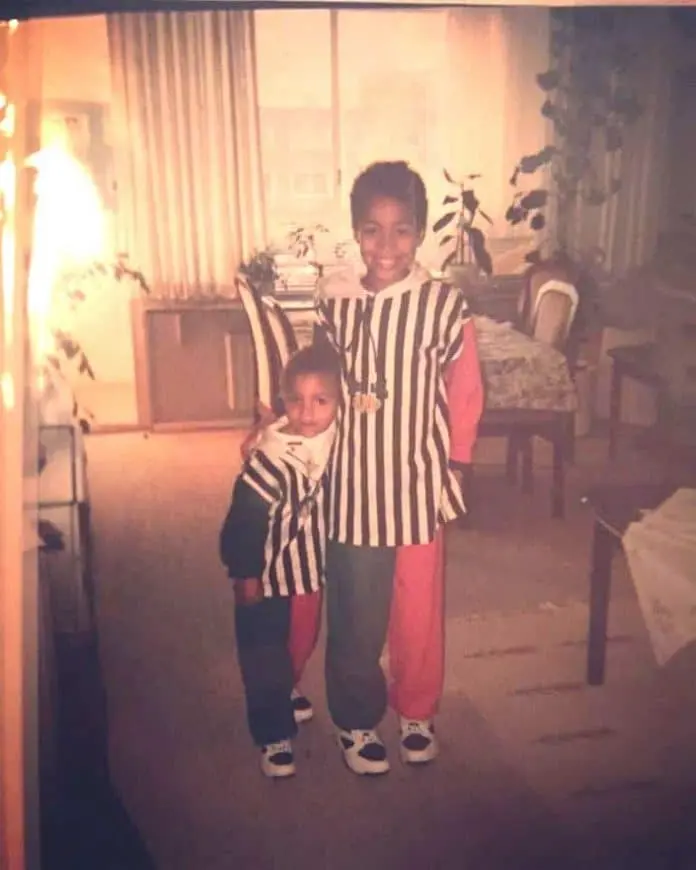 The earliest of Martin Braithwaite's Childhood Photo- Here, he is pictured alongside his sibling in their family home.